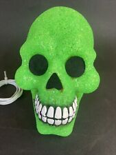 Halloween Illuminated Melted Plastic Jelly Smiling Skull Head Green Light Up picture