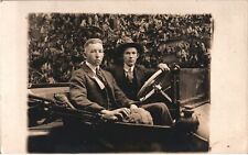 VINTAGE POSTCARD 2 YOUNG MEN POSING FROM WITHIN THEIR MOTOR VEHICLE c. 1915-1920 picture