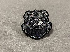 Pinzcity Louis Vuitton Silver Multi Black Grill Glitter Scare Bear Hat Pin picture