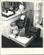 1968 Press Photo Vintage dolls displayed with dollhouses and other accessories picture