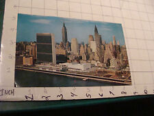 Postcard: United Nations large unused card, stain on back picture