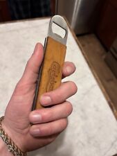 carlsberg wood and metal beer bottle opener picture