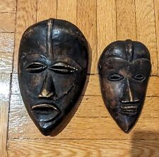 Ashanti tribe masks, Ghana, wood, hand carving, ritual, traditional African art, picture