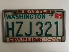 1991 Washington License Plate with Seattle Sparling Cadillac Frame 1980s 1990s picture