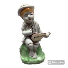 Vintage porcelain figurine girl playing guitar gilt trim green white 5.25” EUC picture