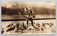 RPPC Alaska, Alaskan Sea Gulls Swarming Man Photo Postcard 1925 A224 picture