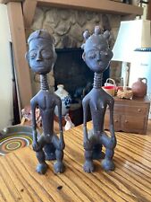 pair of antique carved african figures, male and female beautiful picture