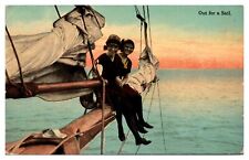 1915 Two Smiling Women Sitting on Sailing Rigging Over Water, Postcard picture