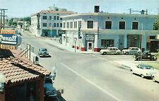 CALIFORNIA POSTCARD: LIQUOR, DRUG STORE & CAFE ON F & FRONT STREET, NEEDLES, CA picture