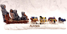 Vintage Alaska Souvenir of Family Traveling with Seven Dogs Pulling Dogsled picture