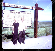 sl63  Original Slide 1972 couple Province of Alberta Mormon Trek sign 592a picture