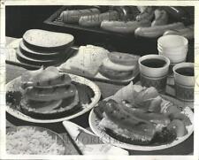 1967 Press Photo Grilled Bratwurst Sauerkraut Rye Bread - RRV59377 picture