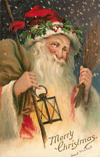 Embossed Postcard Christmas Brown Robe Santa w/Lantern & Switch A.M.B. 15855 picture