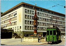 VINTAGE POSTCARD CONTINENTAL SIZE TRAM SCENE AT FISH MARKET IN BASEL SWITZERLAND picture