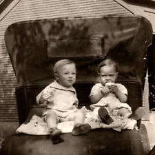 Antique 1900s Child Sitting On Car Summer Photo Photograph picture