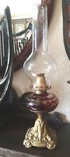 ANTIQUE VICTORIAN Rubby Glass  BRITISH MADE  OIL LAMP AND CHIMNEY Cast Iron Base picture