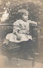 VINTAGE RPPC REAL PHOTO POSTCARD YOUNG CHILD ON CHAIR 081323 picture