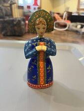 wooden russian figurine blue picture