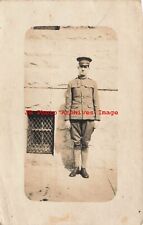 Unknown Location, RPPC, Soldier Standing Outside Stone Building picture