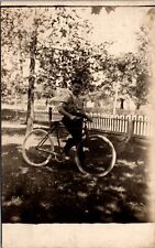 Real Photo Postcard Man on a Bicycle picture