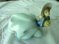 Lladro Figurine Garden Treasures, (5591) Wind Blown Lady w/flowers picture