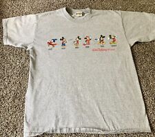 Vintage Walt Disney World Mickey Mouse Through The Decades t shirt picture
