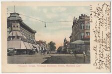 1907 Hanford, California - Seventh Street Businesses - Kings County Postcard picture