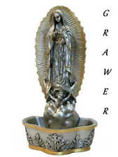 A beautiful stoup with a statue of Our Lady of Guadalupe 7.5