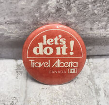 vintage lets do it travel to alberta pinback button picture