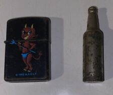 Vintage A.A.D.L.P Lighter 1994 Devil And KEM Inc Bottle Shape Lite. Not Tested picture