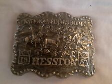 Vintage Hesston new National Finals Rodeo belt buckle. Gold tone. New picture