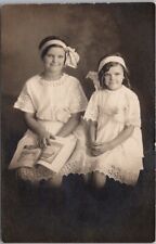 c1910s RPPC Real Photo Postcard 2 Girls in Matching White Dresses / Hair Bows picture