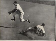 1958 Press Photo Braves 2nd Baseman Red Schoendienst Leaps Sliding Bill Skowron picture