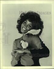 Press Photo Teresa Graves, Actress smiles in portrait with birds - sap19053 picture