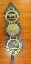 Three Vintage Horse Brass Medallions on  leather strap picture