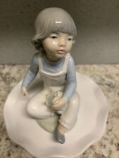 Nao by Lladro Boy With Flowers picture