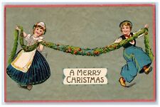 1909 Christmas Girls Dancing Garland Embossed Toledo Illinois IL Posted Postcard picture