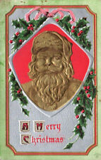 C 1910 PC SANTA CLAUS GOLD FOIL BAS RELIEF PORTRAIT W/ HOLLY A MERRY CHRISTMAS picture