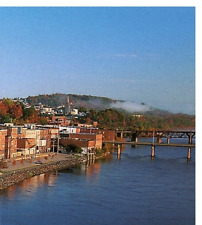 POSTCARD AUGUSTA MAINE VIEW OF DOWNTOWN WITH KENNEBEC RIVER BY KEVIN SHIELDS picture