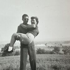 VINTAGE PHOTO man carrying woman boyfriend girlfriend lovers 1950s Romantic picture