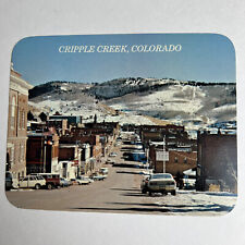 Cripple Creek Colorado Main Street Town Gold Mining City Snow Postcard picture