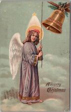 1909 MERRY CHRISTMAS Greetings Postcard Angel in Purple Gown, Ringing Gold Bell picture