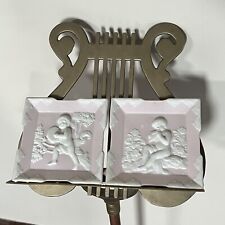 pair of antique pink cherub bisque wall hangings by arnart picture