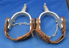 VINTAGE UNMARKED ALUMINUM 5 STAR SPURS WITH LEATHER STRAPS AND UNDERBOOT CHAINS picture