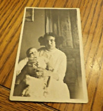 RPPC Woman with Baby Sitting in Her Chair-Early Princess Leia Cosplay picture