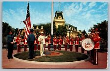 Disneyland Band Flag Lowering Ceremony Town Square VTG Postcard c1959 (Rare) picture