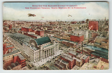Postcard Bird's Eye View Business District C & NW Train Station in Chicago, IL. picture