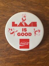 Vintage Pin Back Button Coca Cola Coke Lame is Good picture
