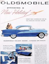 Oldsmobile car ad Vintage 1955 Holiday coupe blue auto advertisement picture