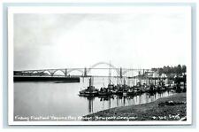 RPPC Newport OR Yaquina Bay Bridge Fishing Fleet Postcard picture